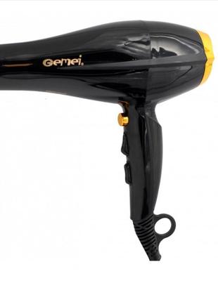 Професійний фен для волосся gemei gm-1780 потужний фен для сушіння та укладання волосся 2400 вт1 фото