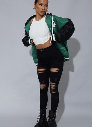 Чорні рвані вузькі джинси