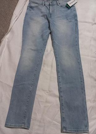 Фирменные стильные джинсы.2 фото