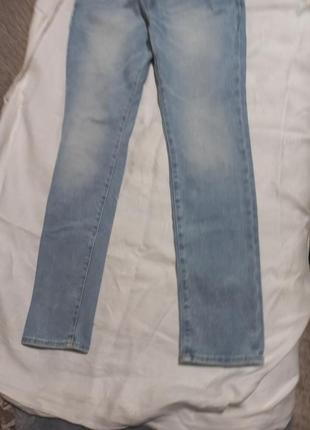 Фирменные стильные джинсы.3 фото