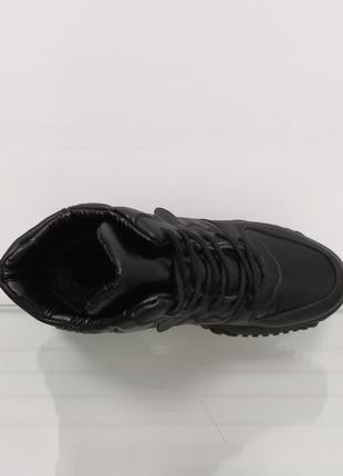 Женские зимние высокие черные кроссовки на платформе9 фото