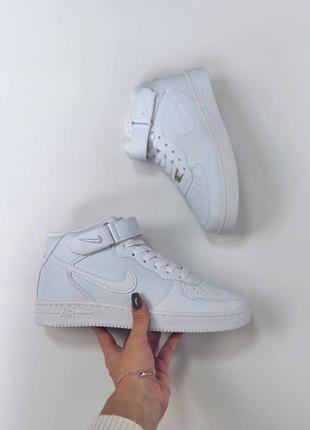 Зимові кросівки nike air force1 фото