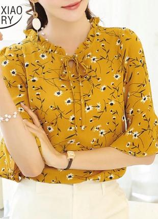 Очень красивая желтая блуза в цветочный принт1 фото