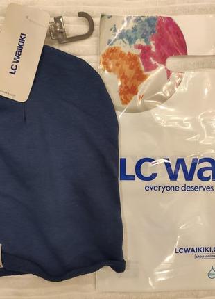 Шапка lc waikiki бледно голубая с лого и закрученным низом, новая.4 фото