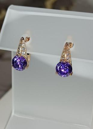 Сережки xuping позолота фіолетовий камінь 1,4см англійський замочок1 фото