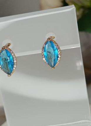 Сережки xuping позолота ніжно блакитний камінь 1,4см2 фото