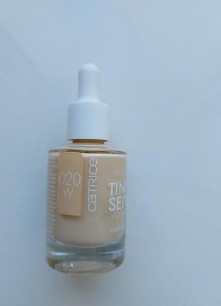 Тональна основа catrice nude drop tinted serum foundation