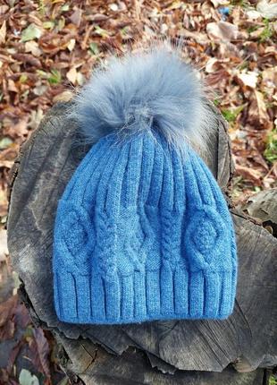 Голубая шапка с косами с натуральным бубоном3 фото