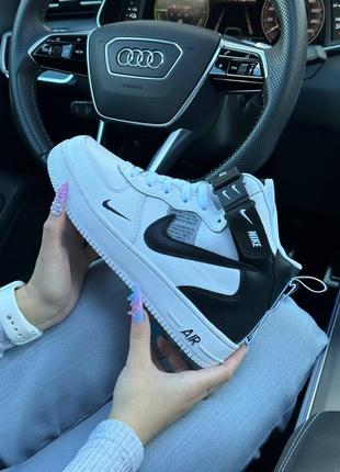 Зимові жіночі кросівки nike air force 12 фото