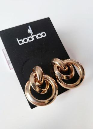 Сережки жіночі круги з переплетінням boohoo золотисті