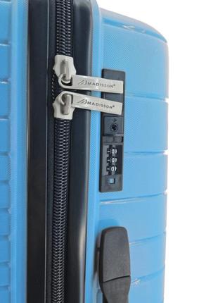 Дорожня пластикова валіза велика l madisson на 4 колесах блакитна5 фото