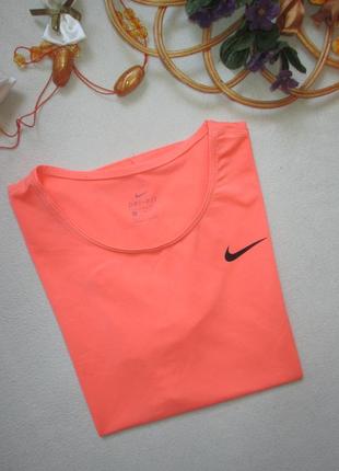 Классная фирменная спортивная футболка кораллового цвета nike оригинал.5 фото