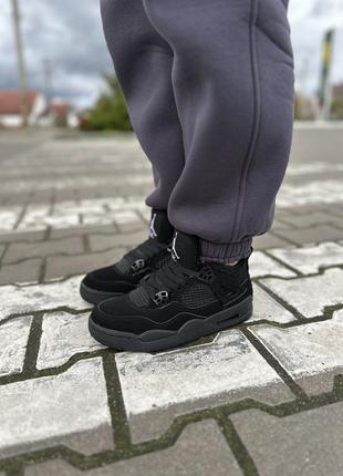 Зимние кроссовки nike air jordan 4 black cat fur1 фото