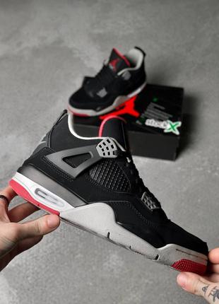 Кросівки жіночі / чоловічі чорні nike air jordan 4 retro bred1 фото