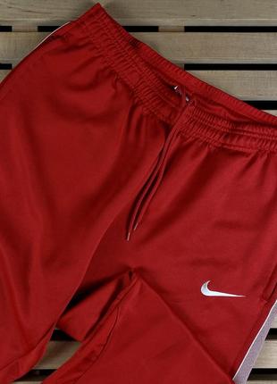 Чоловічі бігові спортивні штани nike розмір l2 фото