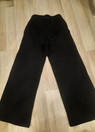 Черные широкие штаны на флисе2 фото