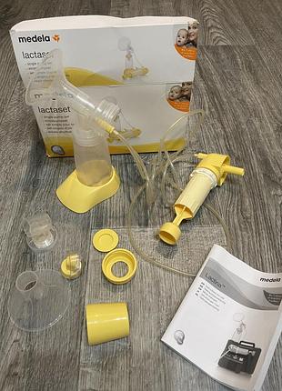 Молокоотсос medela lactaset