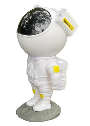 Ночник проектор звездного неба космонавт - лазерный светильник проектор астронавт с пультом5 фото