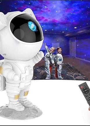 Нічник проектор зоряного неба космонавт - лазерний світильник проектор астронавт з пультом і таймером
