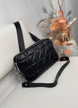 Чорна сумочка+довгий регульований текстильний ремінець.