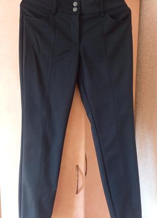 Базовые черные брюки, размер м.1 фото