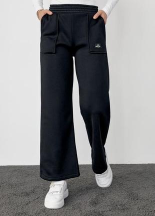 Трикотажные брюки на флисе с накладными карманами6 фото