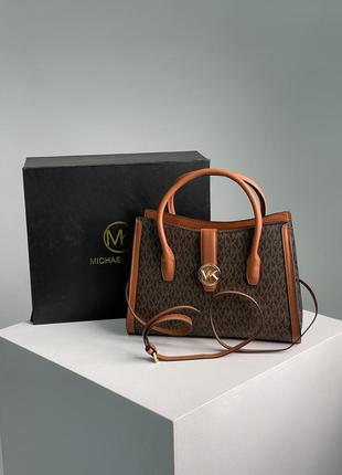 Женская кожаная большая коричневая сумка michael kors2 фото