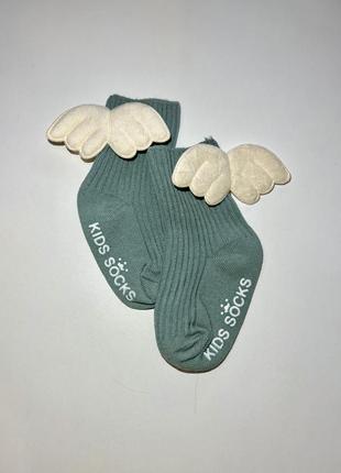 Дитячі шкарпетки з крилами. розмір: до 1 року1 фото