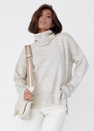 Женский свитер oversize с разрезами по бокам8 фото