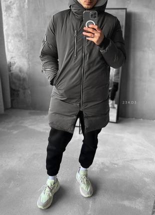 Чоловіча зимова подовжена куртка9 фото