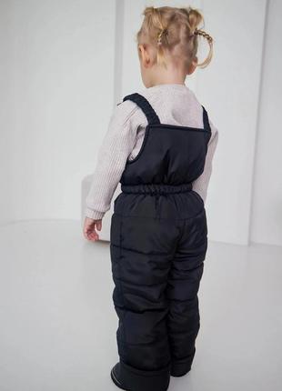 Дитячі зимові комбінезони