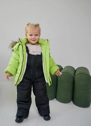 Дитячі зимові комбінезони