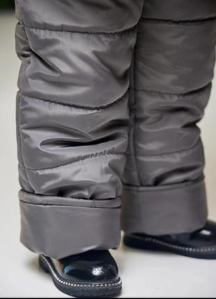 Дитячі зимові комбінезони