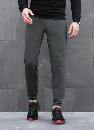 Мужские штаны джоггеры с карманами тёмно-зелёные pobedov 95