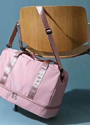 Дорожная сумка женская вместительные имеет 7 разных отделений выдерживает нагрузку до 20 кг розовая