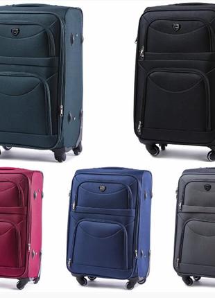 Велика текстильна валіза wings розмір l дорожня тканинна валіза синя на 4 колеса дорожній чемодан чотириколісний8 фото