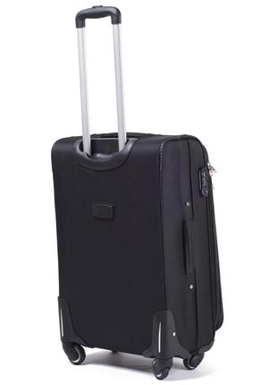 Текстильный большой дорожный чемодан на 4 колесиках цвет бордо wings тканевый чемодан размер l на 4 колеса3 фото