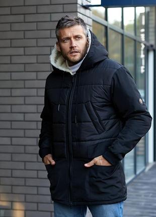 Тёплая мужская удлиненная куртка зима с овчиной плащевка канада на синтепоне пуффер пуховик парка с капюшоном на молнии черный2 фото