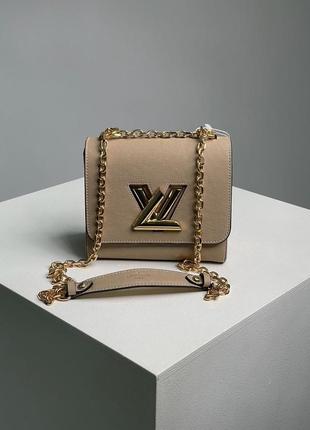 Женская сумка louis vuitton large  в бежевом цвете на цепочке топ модель луи виттон4 фото