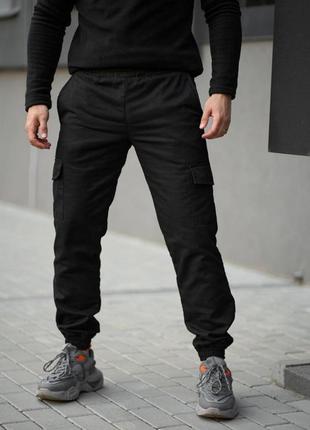 Чоловічі зимові тактичні штани з карманами черные на флісі брюки карго теплі з начосом (bon)1 фото
