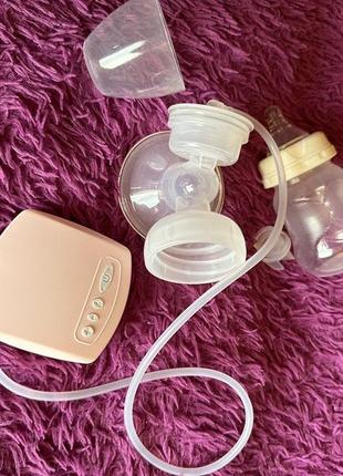 Электрический молокоотсос breast pump