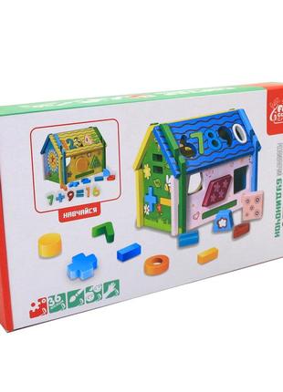Развивающая деревянная игрушка домик-сортер fun game фигуры цифры 16*19*14 см (57107)6 фото