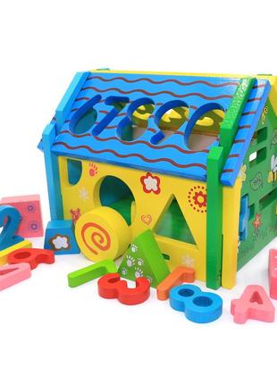 Развивающая деревянная игрушка домик-сортер fun game фигуры цифры 16*19*14 см (57107)2 фото