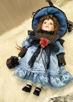 Фарфоровая кукла leonardo collection.7 фото