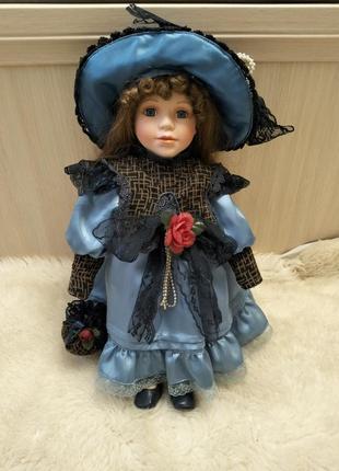 Фарфоровая кукла leonardo collection.2 фото