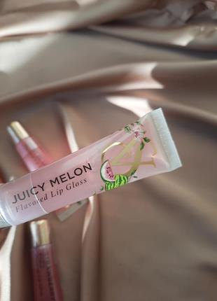 Оригинальный блеск для губ victoria’s secret. виктория сикрет. выктория сикрет. flavored lip gloss juicy melon1 фото