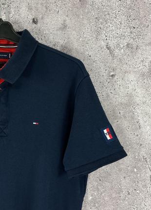 Tommy hilfiger polo футболка чоловіча темно синя розмір м/л2 фото