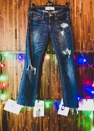 Темные рваные джинсы от hollister1 фото