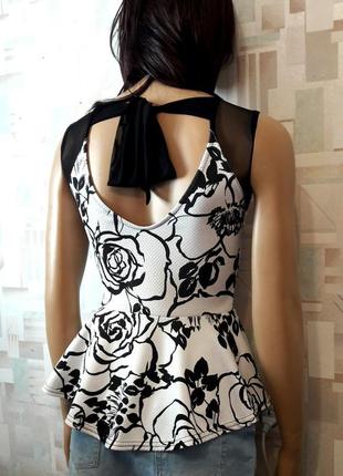 Стильная фактурная черно-белая  блуза с баской от quiz2 фото
