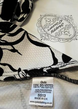 Стильная фактурная черно-белая  блуза с баской от quiz7 фото